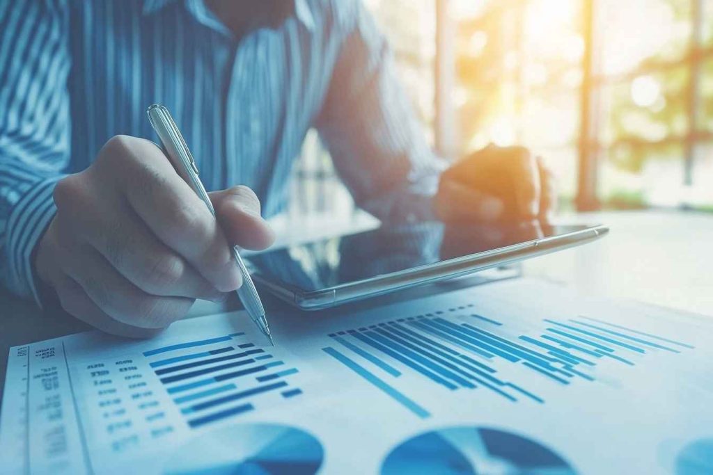 A professional analyzing business data to support strong inductive arguments.