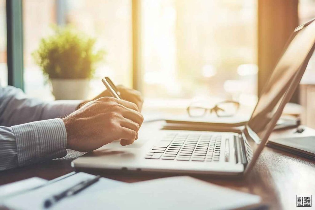 Male employee handling feedback with professionalism and openness.