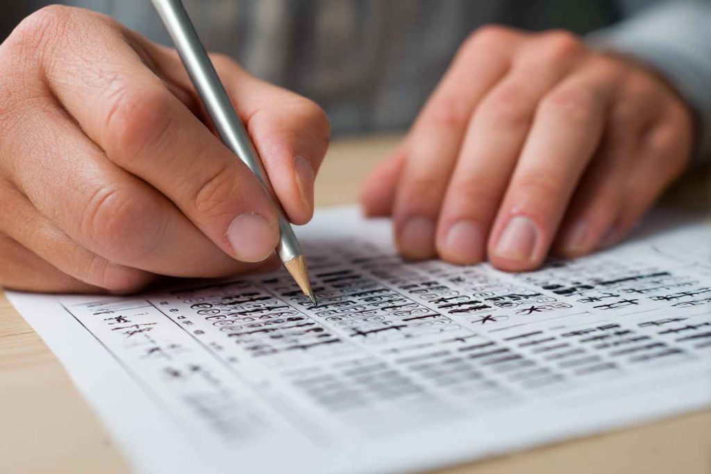 Manual scoring of a printable 16 Personalities Test using a scoring grid