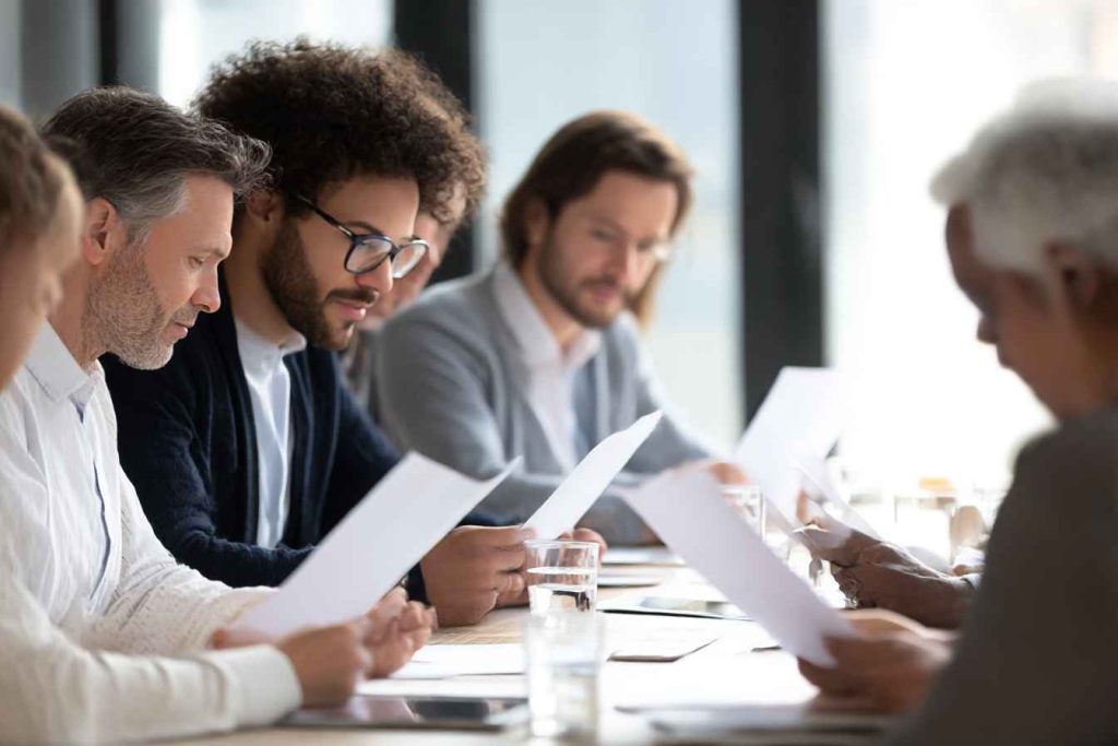 Multilingual professionals taking the 16 Personalities Test in different languages