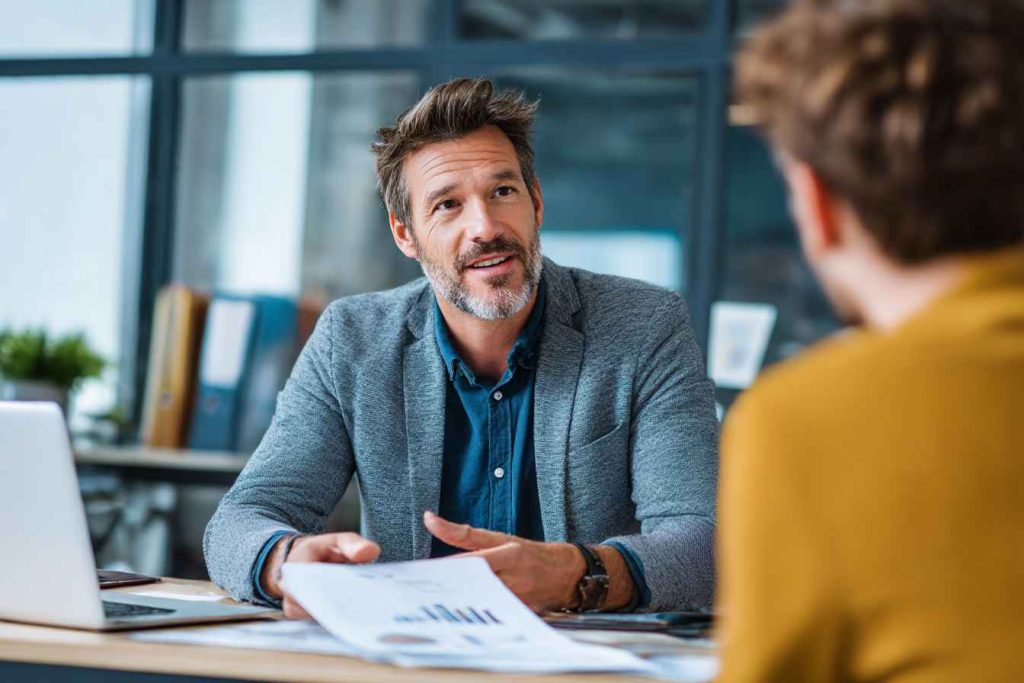 How Accurate Is the 16 Personalities Test for Hiring? 3 Manager using 16 Personalities report in coaching session