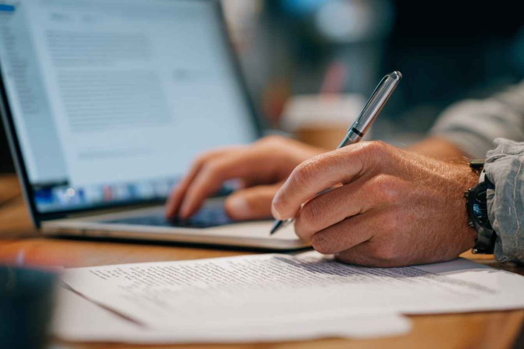 Candidate optimizing blog content during a structured SEO assessment.