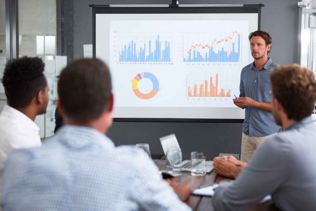 HR team reviewing SEO assessment test results to compare candidates.